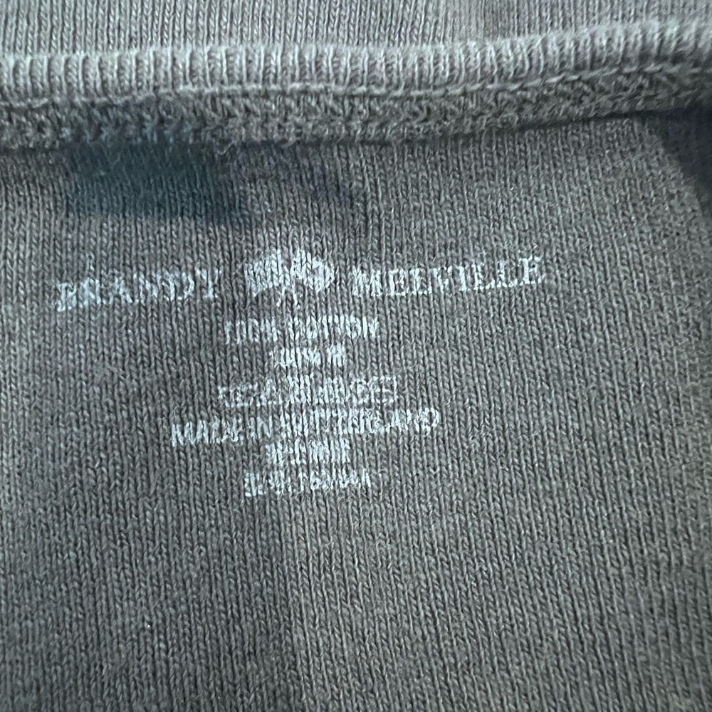 Brandy Melville tube top with ties around the neck.